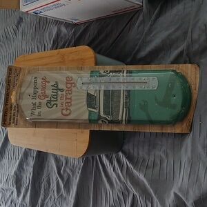 Indoor/outdoorMetal Thermometer "What Happens In The Garage Stays In The Garage"